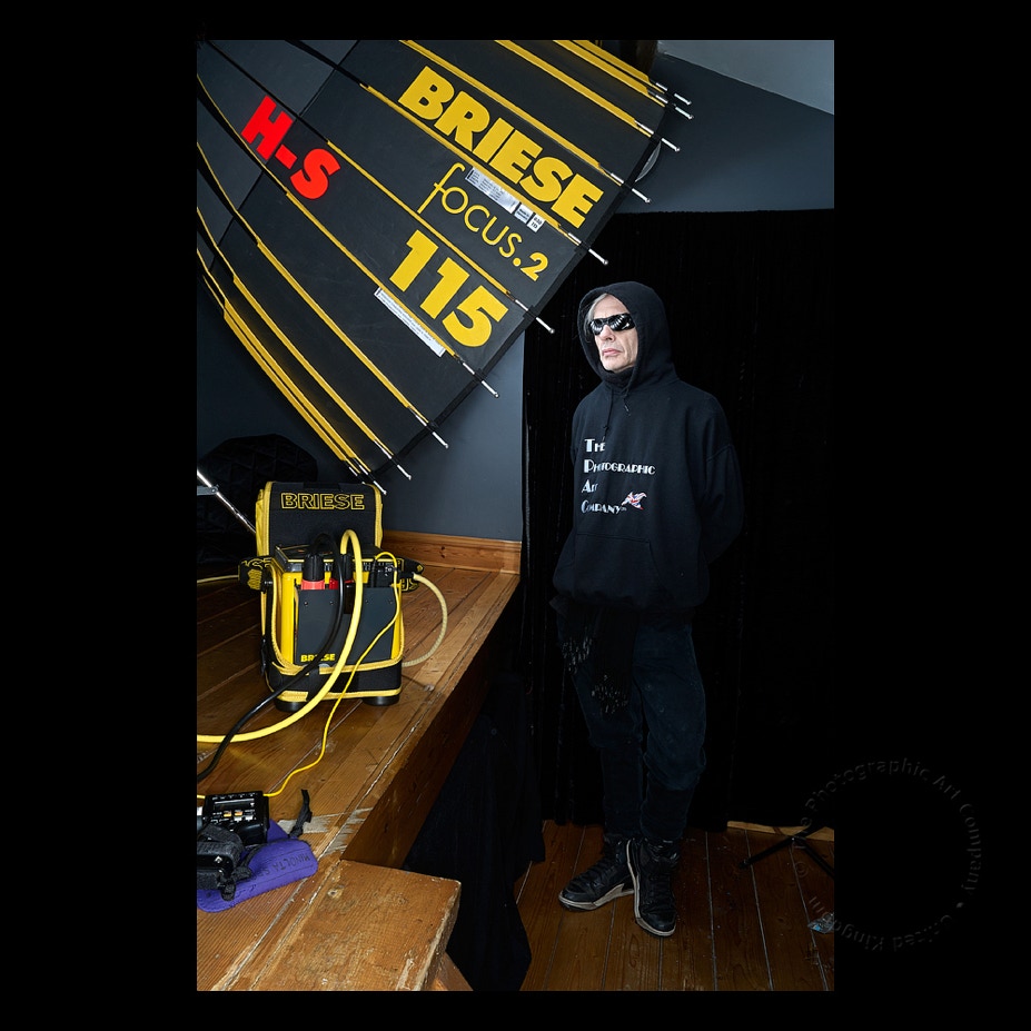 snap-shot-behind-our-humble-studio-scenes!  Richard ‘posing-on-set’ with our Briese focus.2 flash-lighting system   